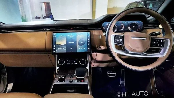 Many carmakers are hustling to grab the in-car technology market pie.