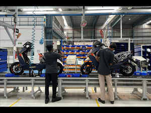 FILE PHOTO: Workers assemble Ather 450X electric scooter inside Ather Energy's manufacturing facility in Hosur