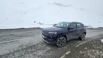Jeep Compass munches miles effortlessly. In the picture above, it is parked near Baralachala Pass, where there was a thick layer of snow throughout the mountains. (Paarth Khatri)