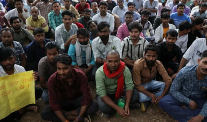 Factory workers hold a protest demanding wage hikes from their company