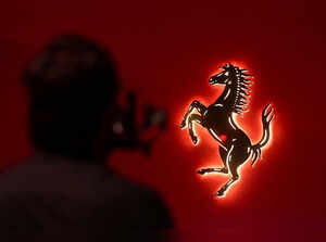 The Ferrari logo is displayed during an event for the unveiling of the 849 Testarossa during an event in Mumbai