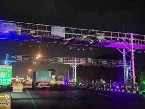 National Highway Authority of India (NHAI) launched India's first barrierless tolling system at the Choryasi Toll Plaza in Surat. (ANI Video Grab  )