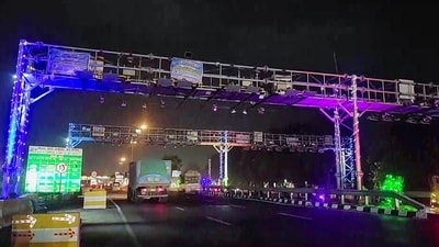 National Highway Authority of India (NHAI) launched India's first barrierless tolling system at the Choryasi Toll Plaza in Surat. (ANI Video Grab  )