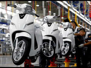 FILE PHOTO: E-scooters are seen at an assembly line of Vinfast Auto and Motorcycle factory in Hai Phong city