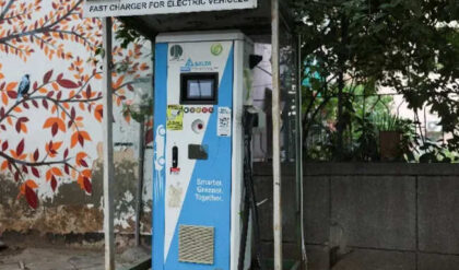 An electric car charging station is seen at a market in New Delhi