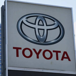 Sign board of Toyota Motor on display at Toyota Mobility Tokyo dealership in Tokyo