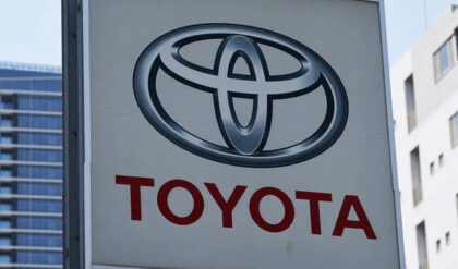 Sign board of Toyota Motor on display at Toyota Mobility Tokyo dealership in Tokyo