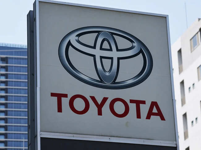 Sign board of Toyota Motor on display at Toyota Mobility Tokyo dealership in Tokyo