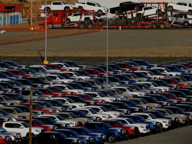 FILE PHOTO: Newly assembled vehicles are seen at a stockyard of the automobile plant Toyota Motor Manufacturing of Baja California in Tijuana, Mexico