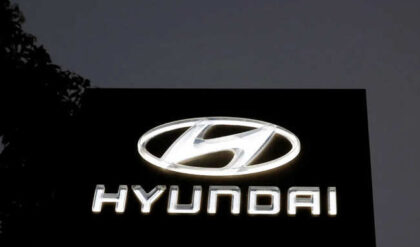 FILE PHOTO: The Logo of Hyundai Motor India Limited is seen outside a car showroom, in Ahmedabad