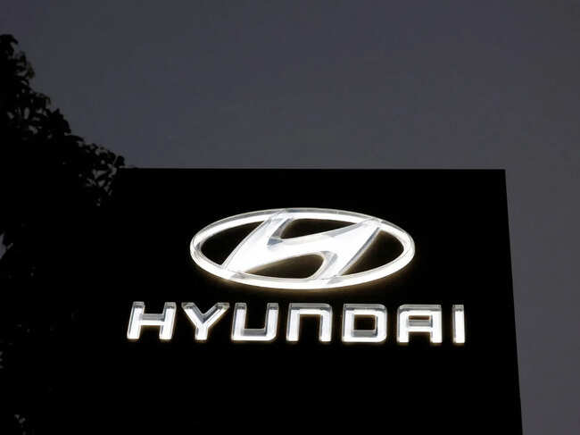 FILE PHOTO: The Logo of Hyundai Motor India Limited is seen outside a car showroom, in Ahmedabad