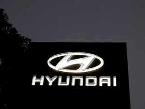 FILE PHOTO: The Logo of Hyundai Motor India Limited is seen outside a car showroom, in Ahmedabad